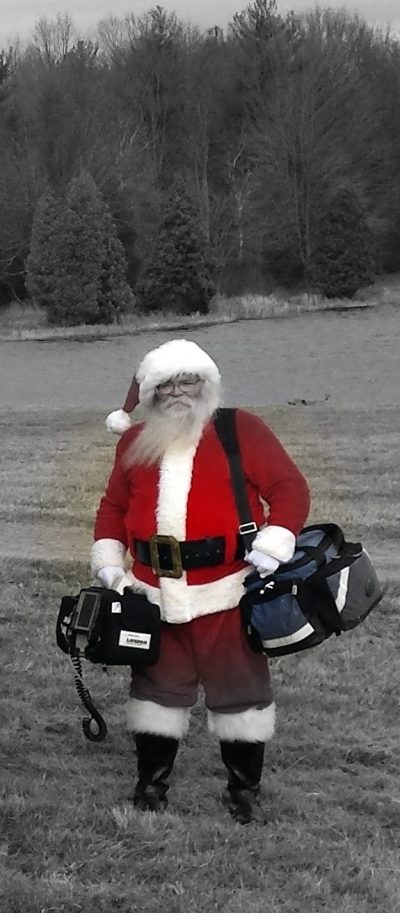 Santa carrying a monitor and ALS bag