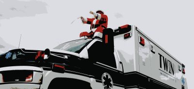 Santa using ambulance as a sleigh